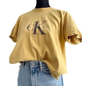 Vintage classic Calvin Klein mustard tee